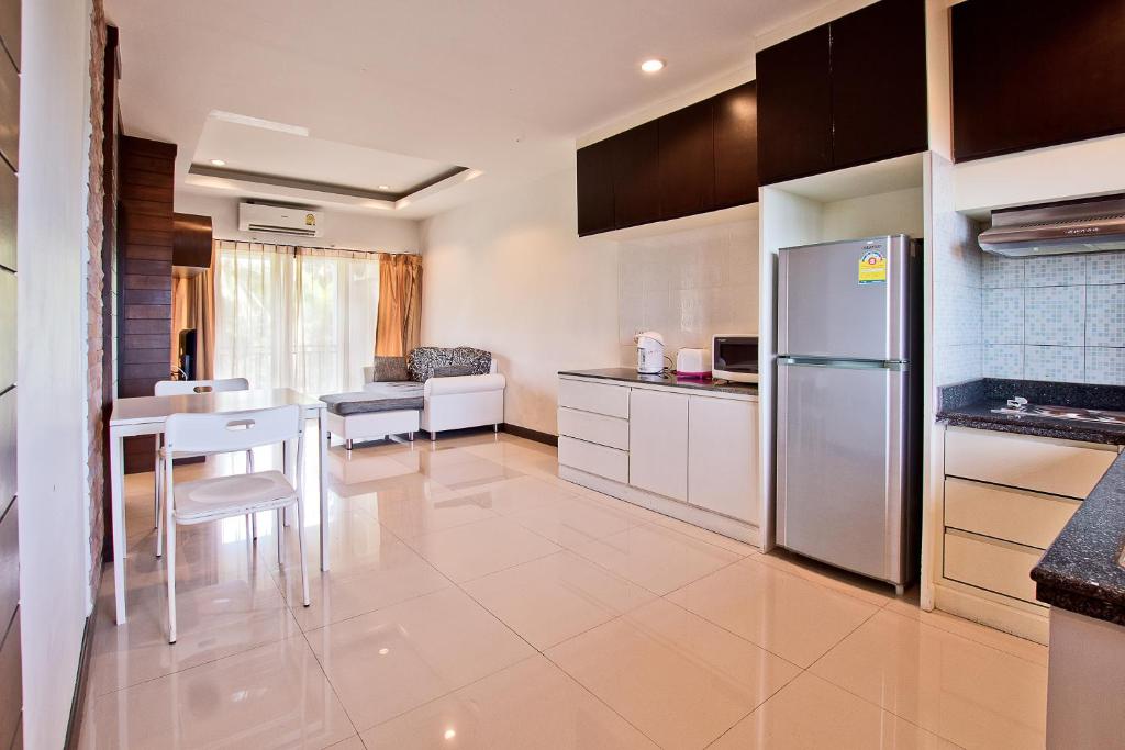 Kuchyň nebo kuchyňský kout v ubytování V Condominium Samui