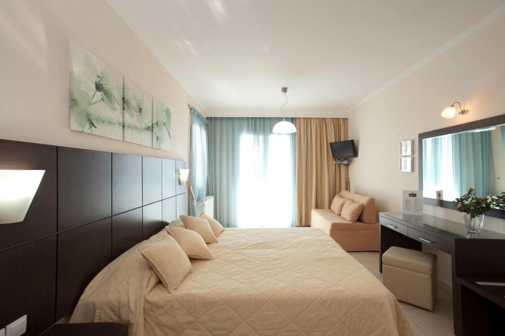 Posteľ alebo postele v izbe v ubytovaní Hotel Anezina