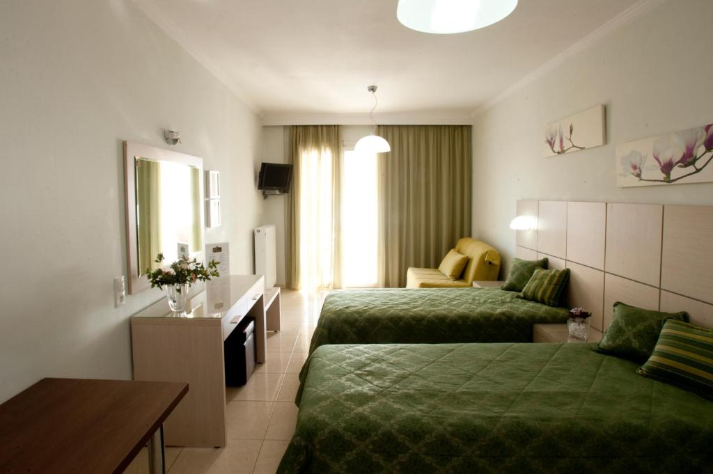 Posteľ alebo postele v izbe v ubytovaní Hotel Anezina