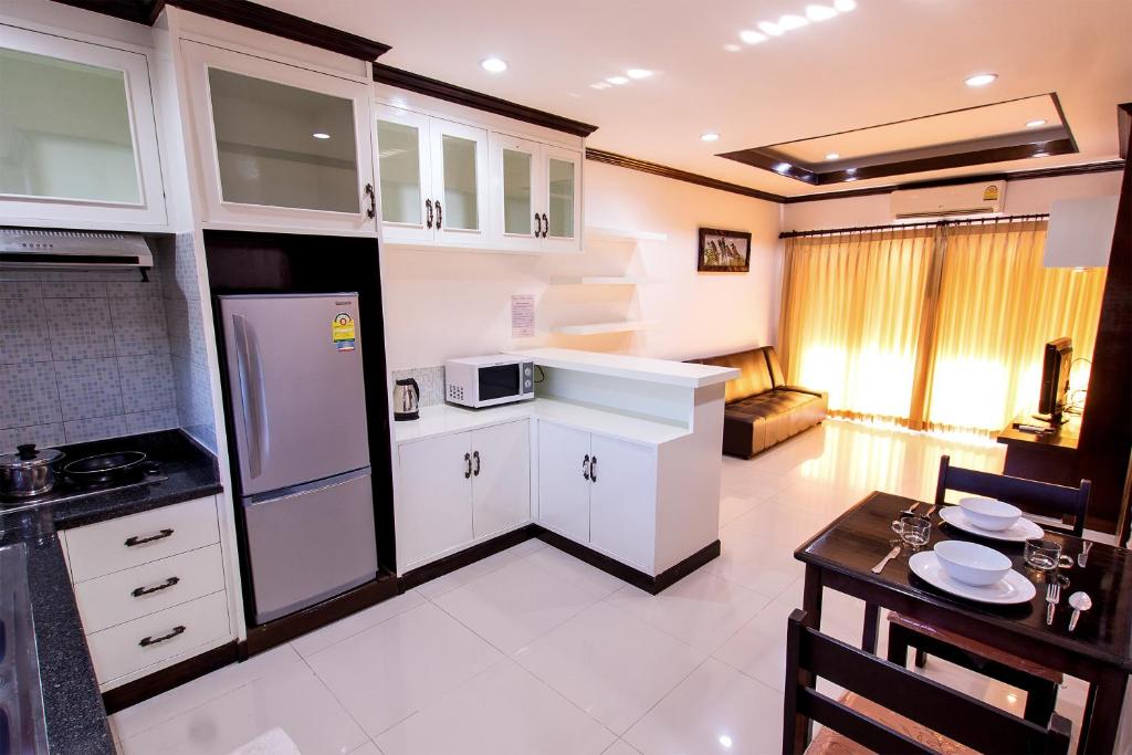 Kuchyň nebo kuchyňský kout v ubytování V Condominium Samui