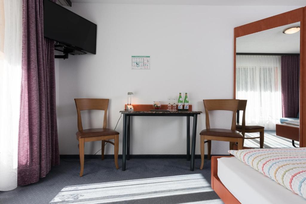 TV a/nebo společenská místnost v ubytování Hotel-Restaurant Ackersand