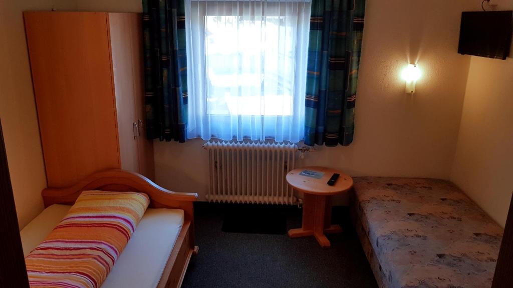 Postel nebo postele na pokoji v ubytování Haus Sonnheim