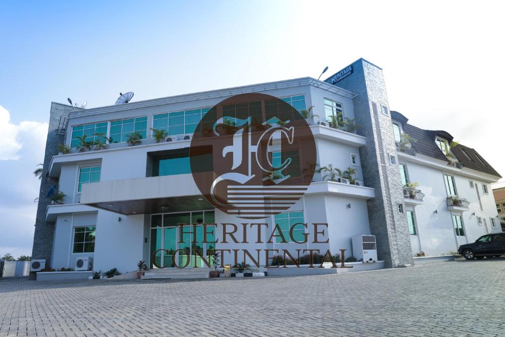 a building with a sign that reads the rilage championship inn at Heritage Continental Hotel in Akure