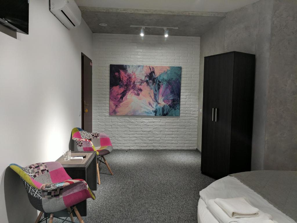 TV a/nebo společenská místnost v ubytování Art Hotel Palma