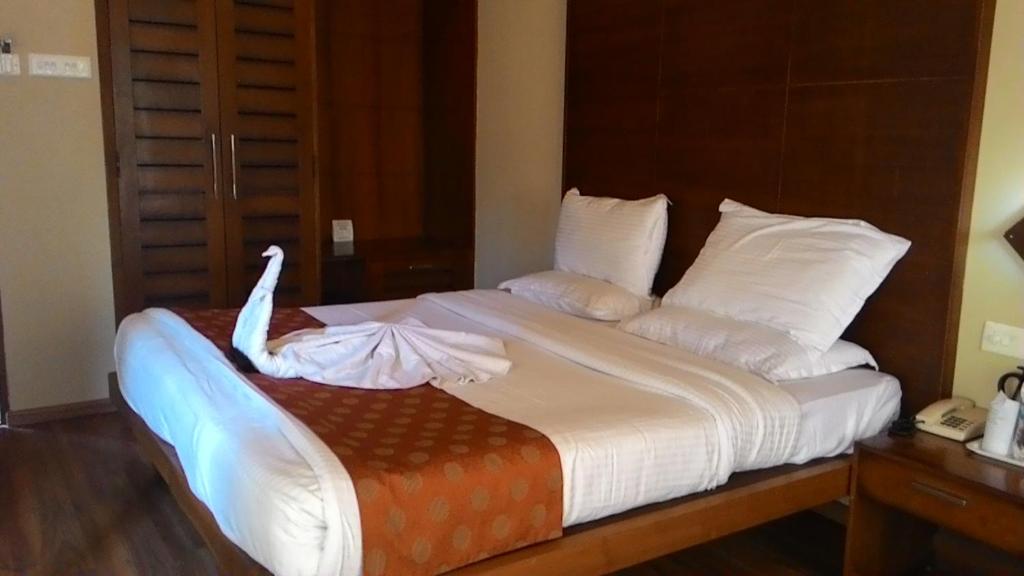 Postel nebo postele na pokoji v ubytování Grand Plaza