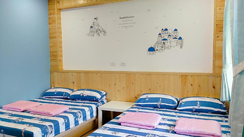 Postel nebo postele na pokoji v ubytování Fei Ying Homestay
