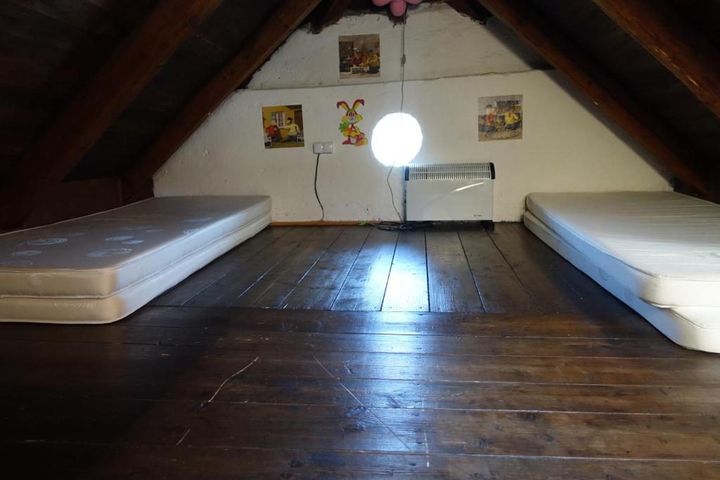 Postel nebo postele na pokoji v ubytování Ašika