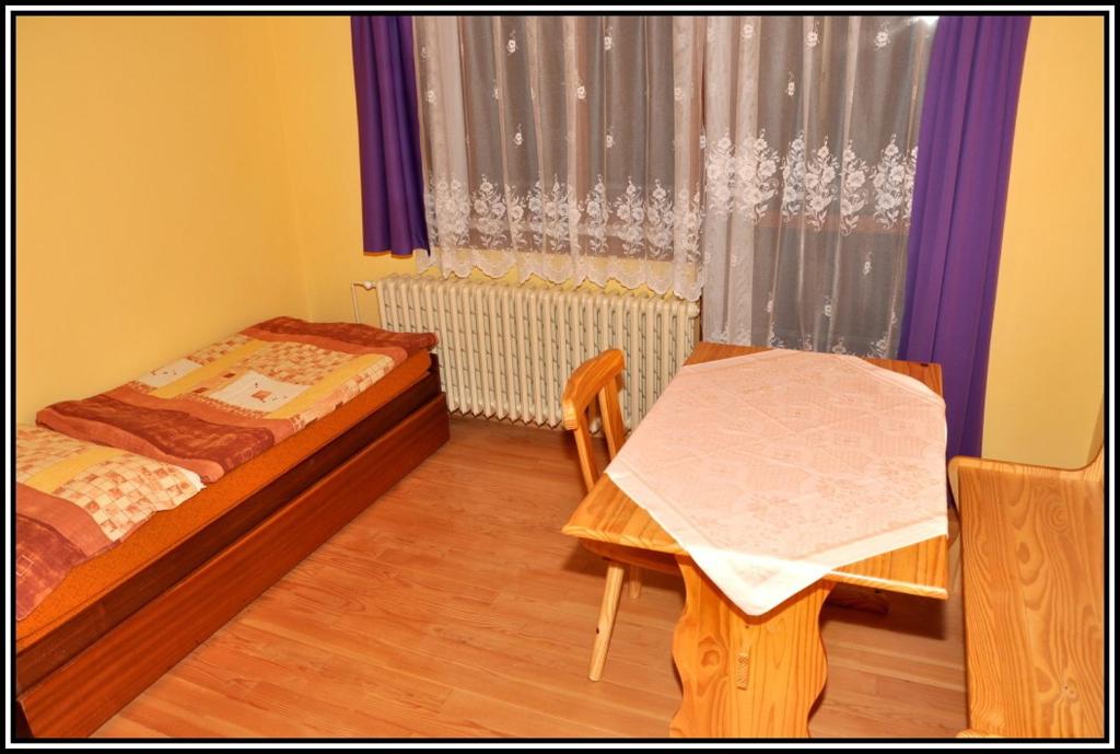 Postel nebo postele na pokoji v ubytování Ubytování Petrovičky