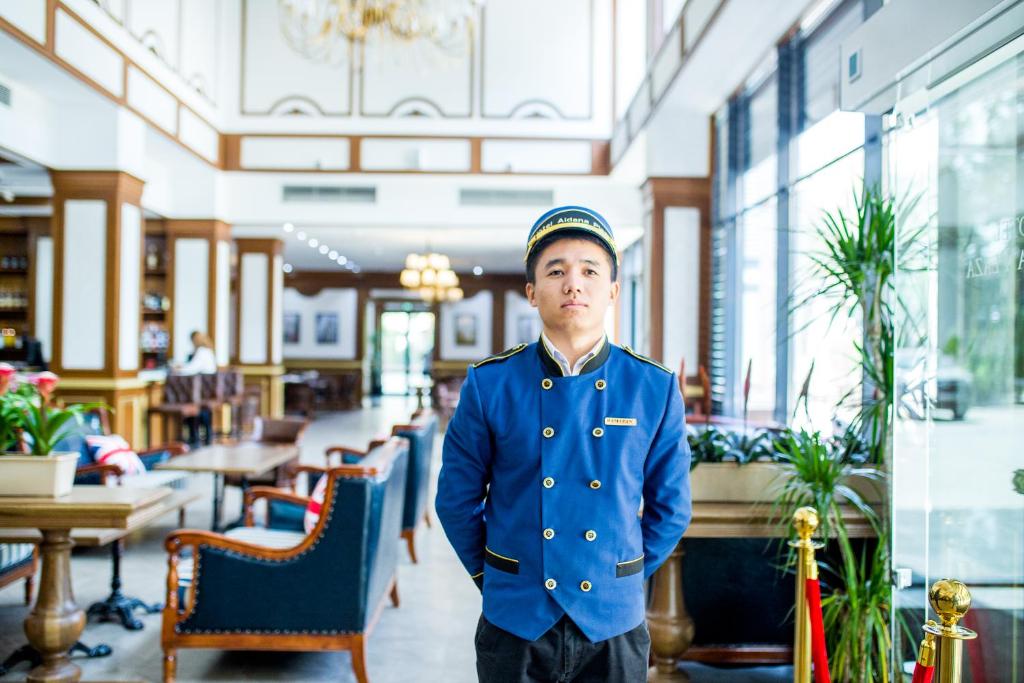 Členové personálu v ubytování Aidana Plaza Hotel