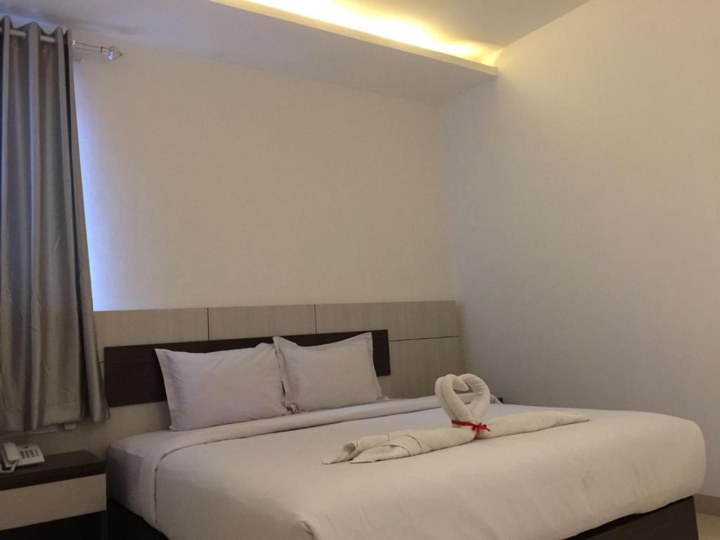Postel nebo postele na pokoji v ubytování Seventeen Hotel