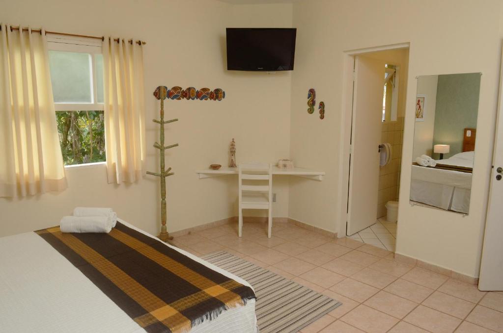 A cozinha ou cozinha compacta de Pousada Villa Maritima
