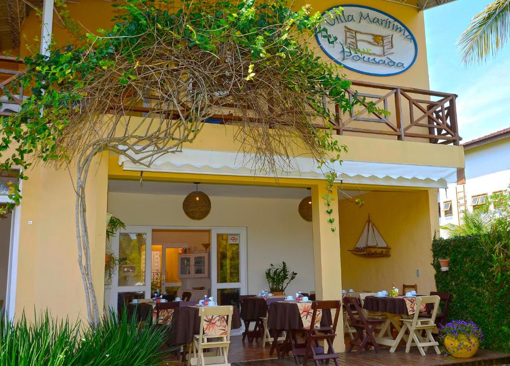 Um restaurante ou outro lugar para comer em Pousada Villa Maritima