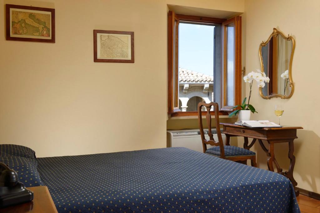 Titano Hotel 3*