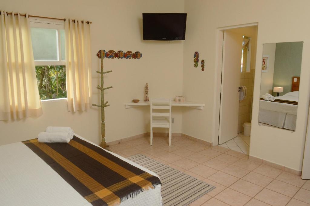 A cozinha ou cozinha compacta de Pousada Villa Maritima