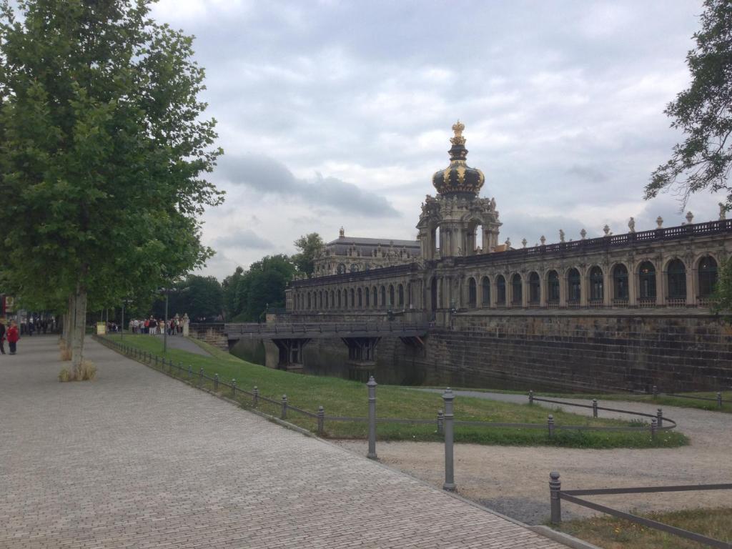 a large stone building with a tower in the background at FeWo am Zwinger 2 in Dresden