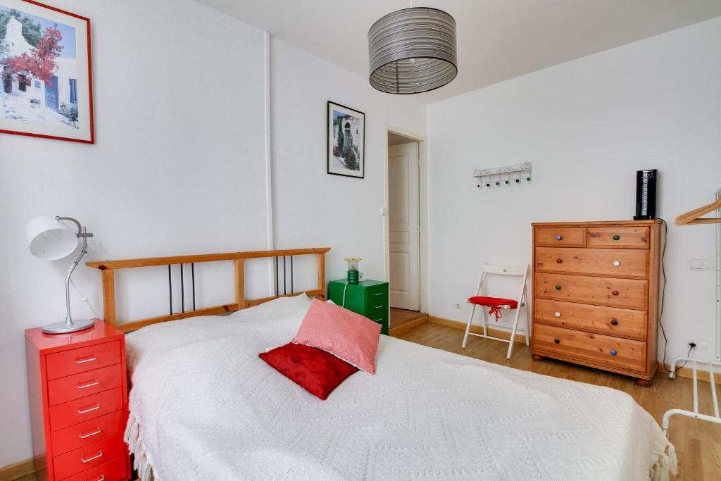 Llit o llits en una habitació de Welkeys Apartment - Regourd