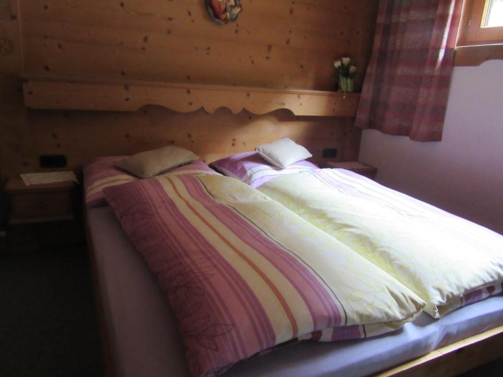 Postel nebo postele na pokoji v ubytování Gasthof Waldrast