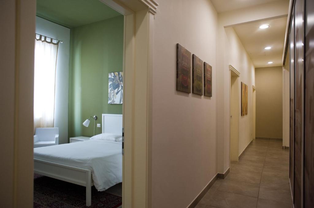 Postel nebo postele na pokoji v ubytování B&B Suite Paciotti