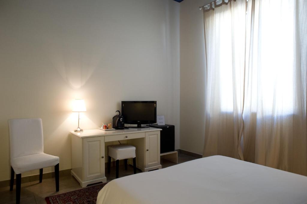 TV a/nebo společenská místnost v ubytování B&B Suite Paciotti