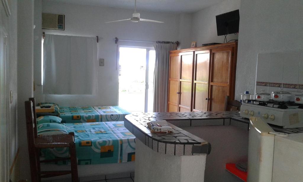 Kuchyň nebo kuchyňský kout v ubytování Hotel Sarabi