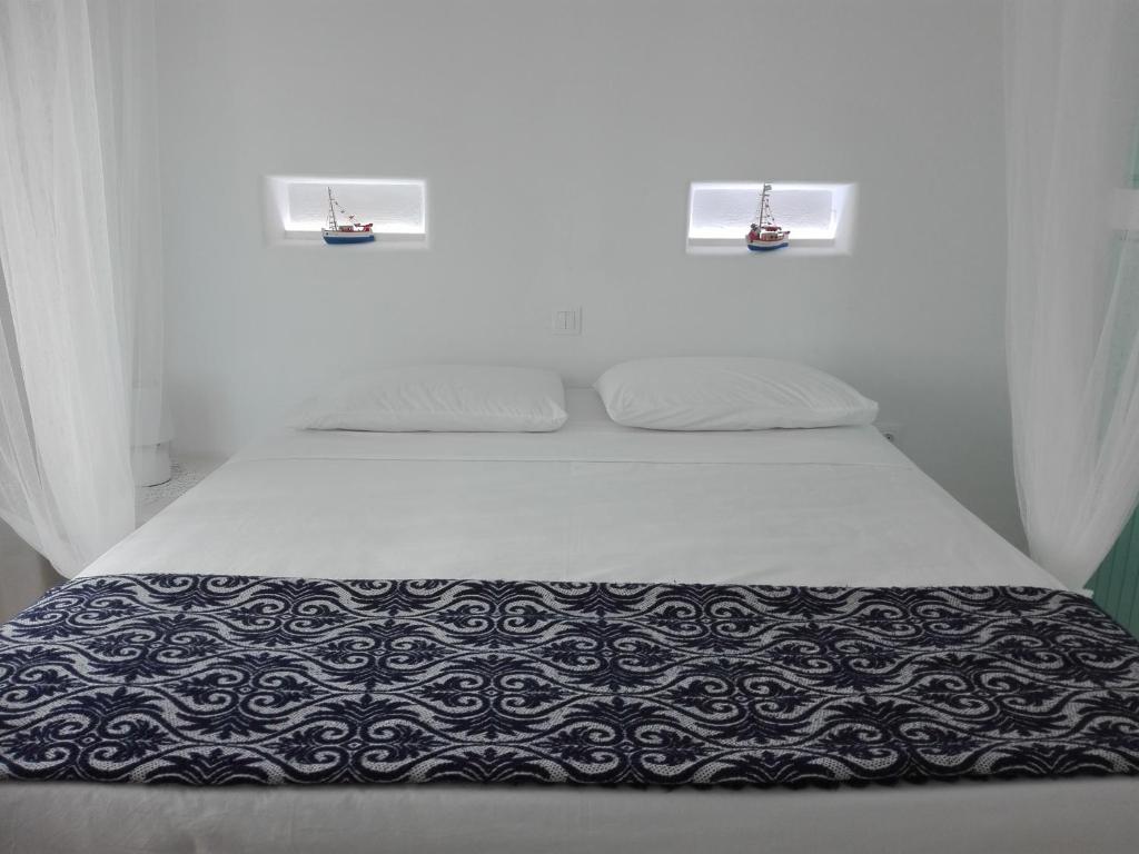 Postel nebo postele na pokoji v ubytování Tilos Island house