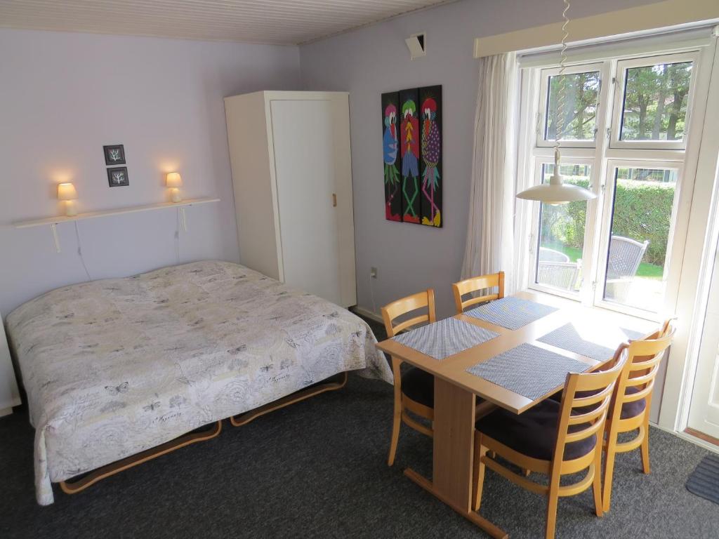 Postel nebo postele na pokoji v ubytování Motel Garni Blåvand