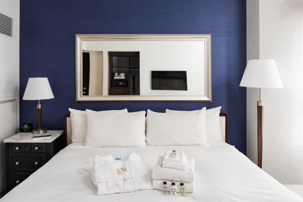 Postel nebo postele na pokoji v ubytování Phoenix Park Hotel
