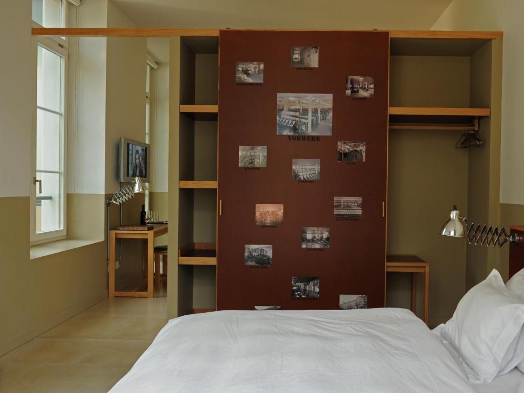 Postel nebo postele na pokoji v ubytování lofthotel Walensee