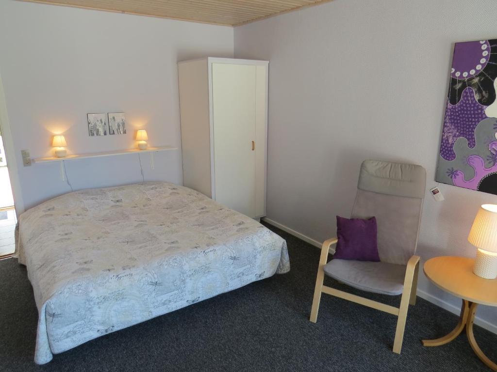 Postel nebo postele na pokoji v ubytování Motel Garni Blåvand
