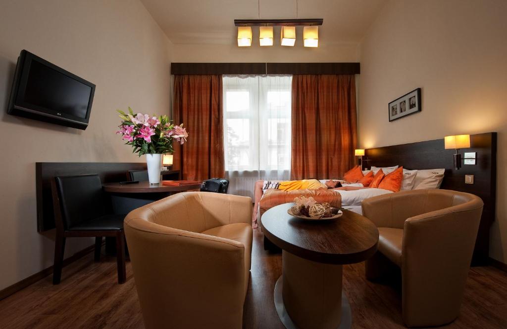 TV a/nebo společenská místnost v ubytování Spatz Aparthotel