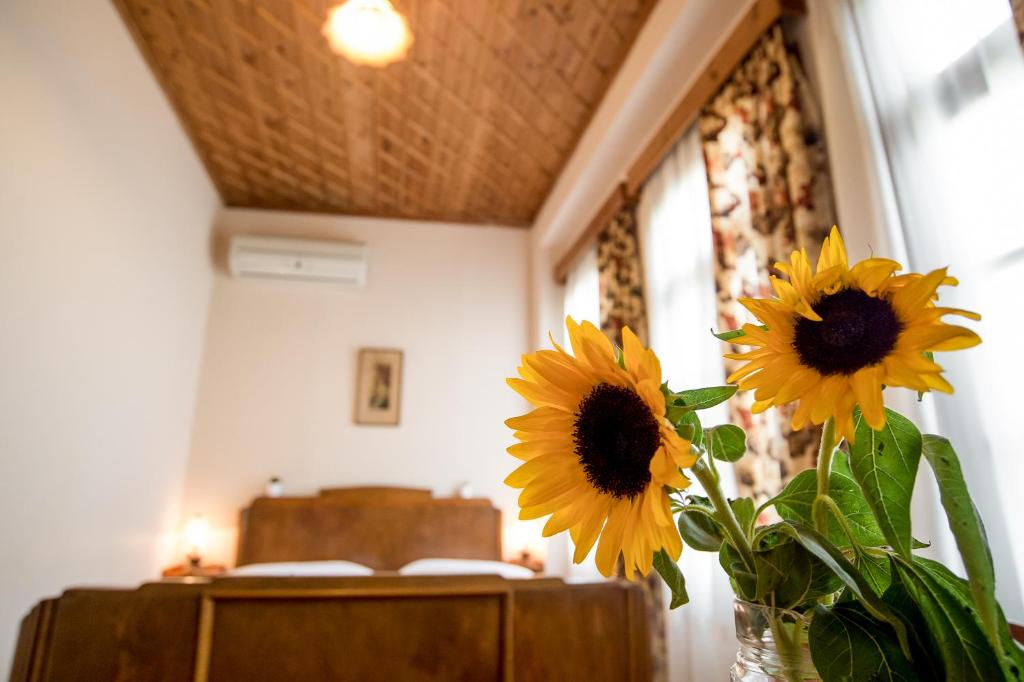 Postel nebo postele na pokoji v ubytování Hotel Kalemi