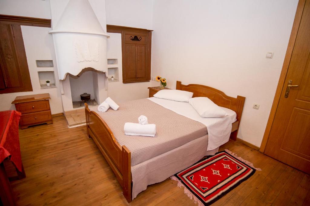 Postel nebo postele na pokoji v ubytování Hotel Kalemi