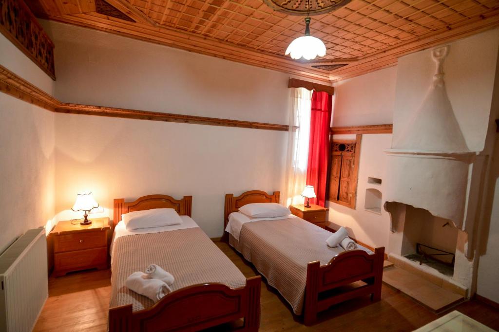 Postel nebo postele na pokoji v ubytování Hotel Kalemi