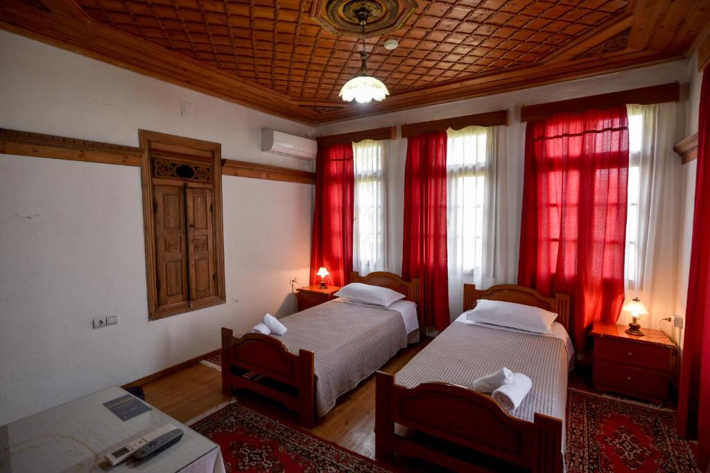 Postel nebo postele na pokoji v ubytování Hotel Kalemi