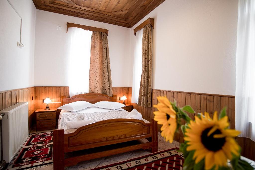 Postel nebo postele na pokoji v ubytování Hotel Kalemi