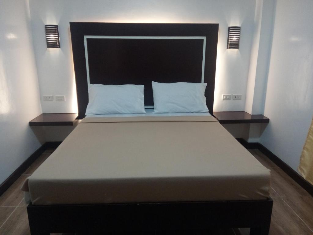 Postel nebo postele na pokoji v ubytování Seashore Beach Resort