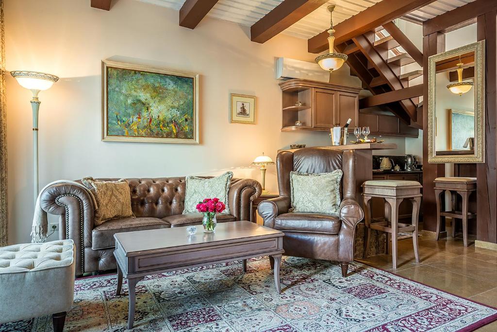 Posezení v ubytování Hotel Pušų paunksnėje