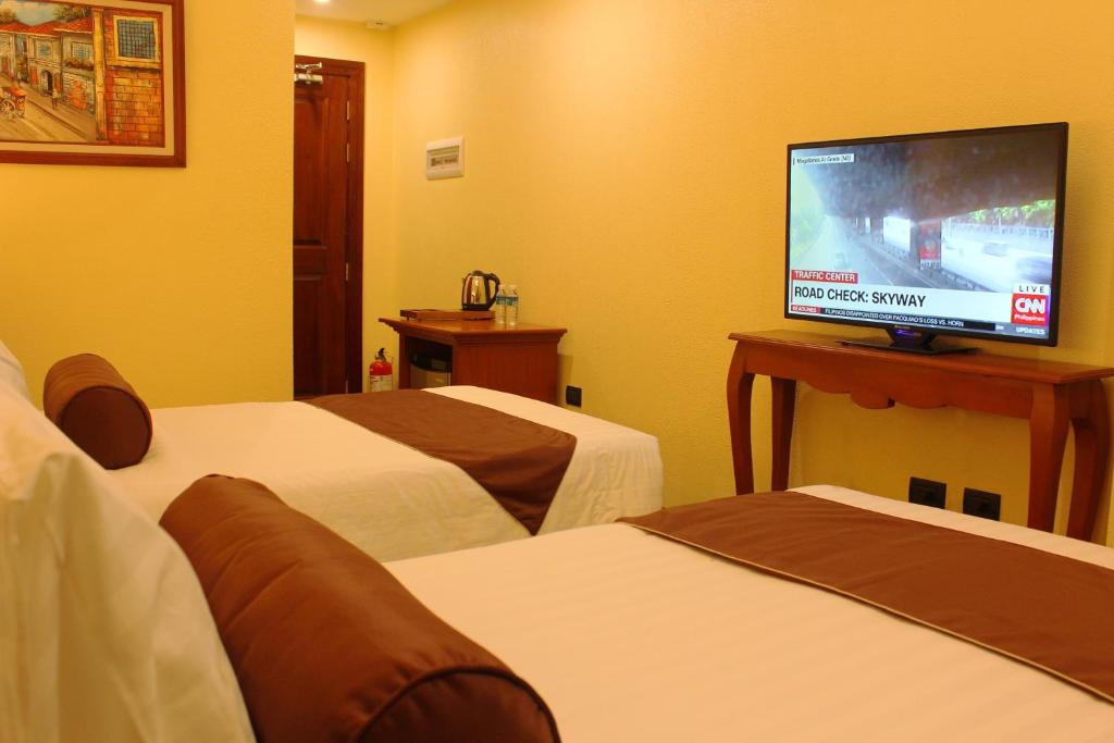 TV a/nebo společenská místnost v ubytování Sunlight Hotel Coron