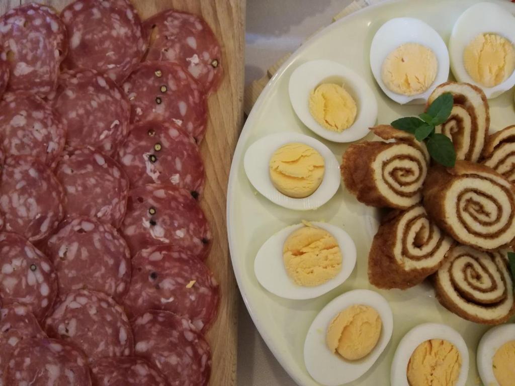 a plate of hard boiled eggs and some bread at Masseria Asciano in Ostuni