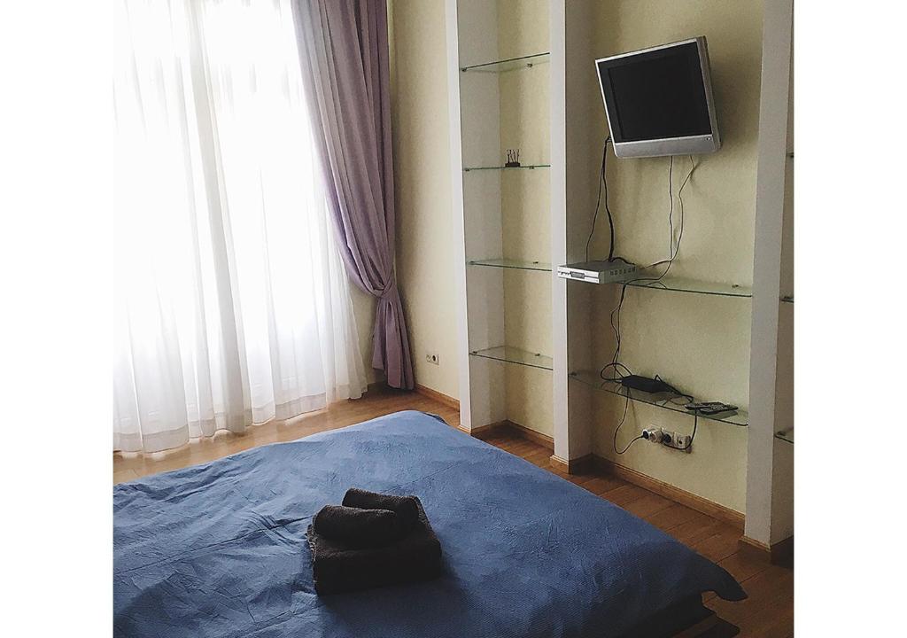 Apartment on Lukyanovska - バルコニー付きのアパート