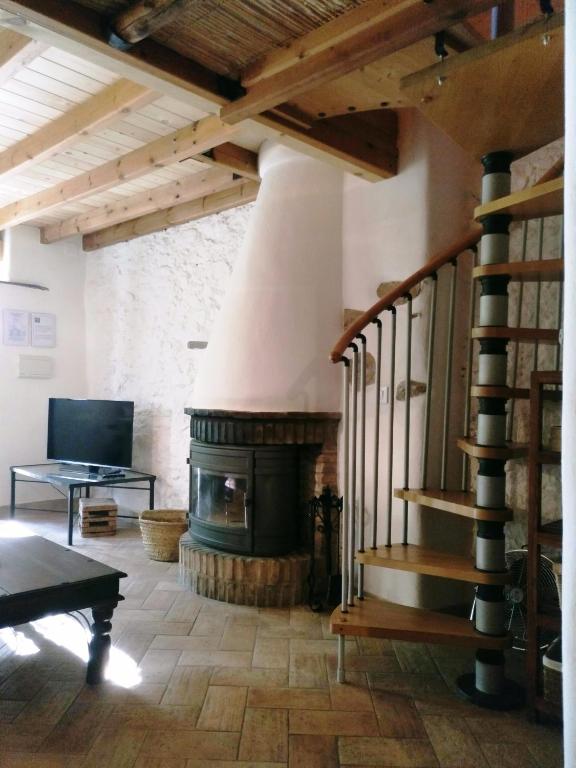 Televízia a/alebo spoločenská miestnosť v ubytovaní Casa con encanto en Alájar