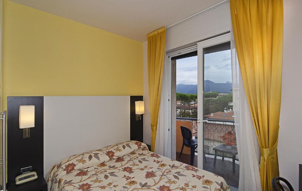 Postel nebo postele na pokoji v ubytování Hotel Eur