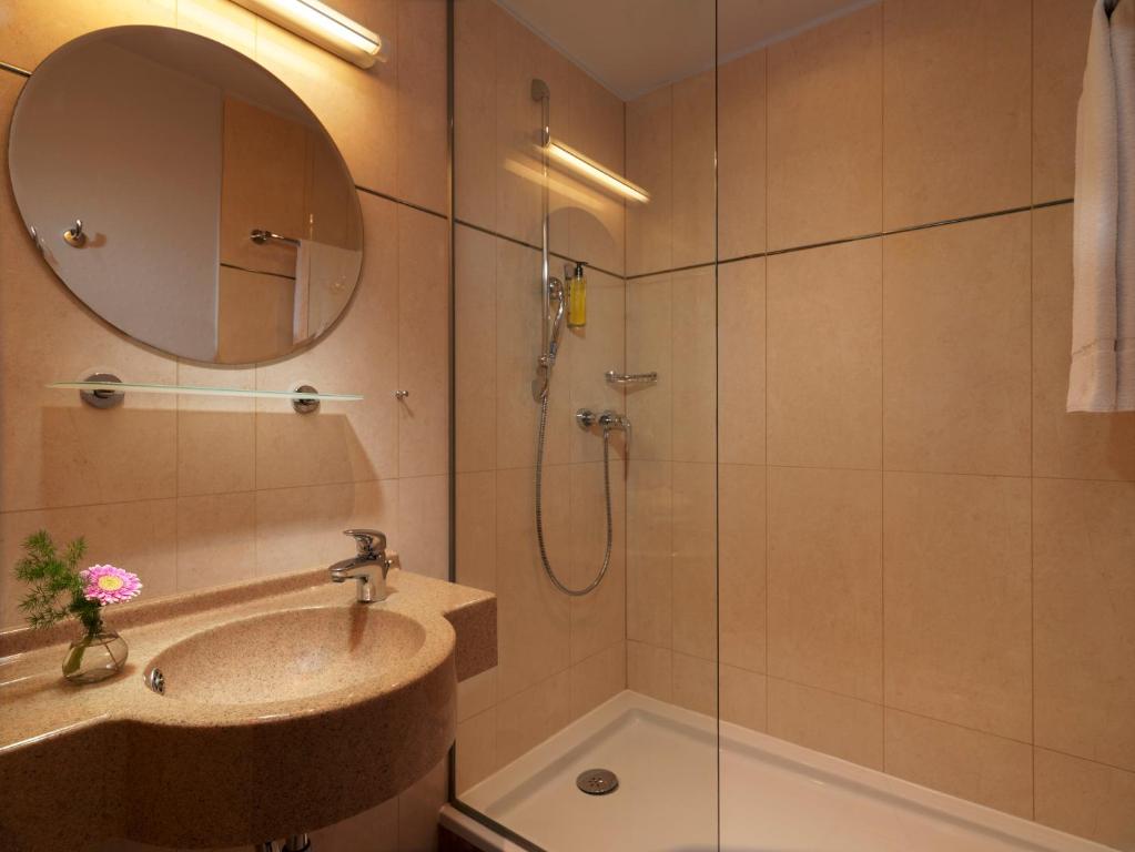 Koupelna v ubytování Hotel Parc Plaza
