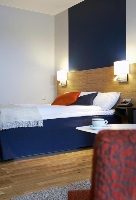 Postel nebo postele na pokoji v ubytování Quality Hotel Waterfront