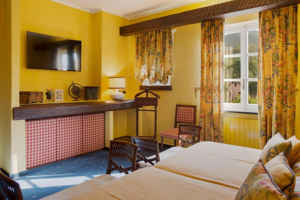 Posteľ alebo postele v izbe v ubytovaní La Meridiana ReIais & Chateaux