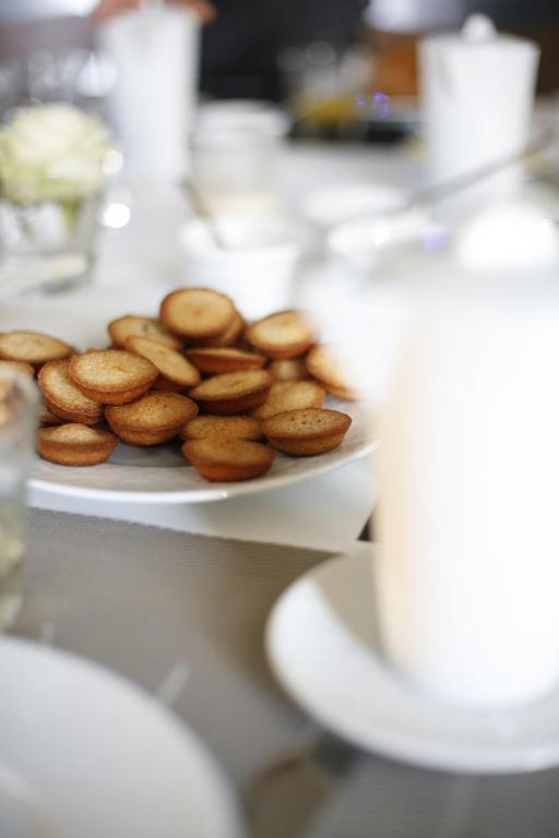 a plate of donuts sitting on a table at Les 4 étoiles in Montpellier