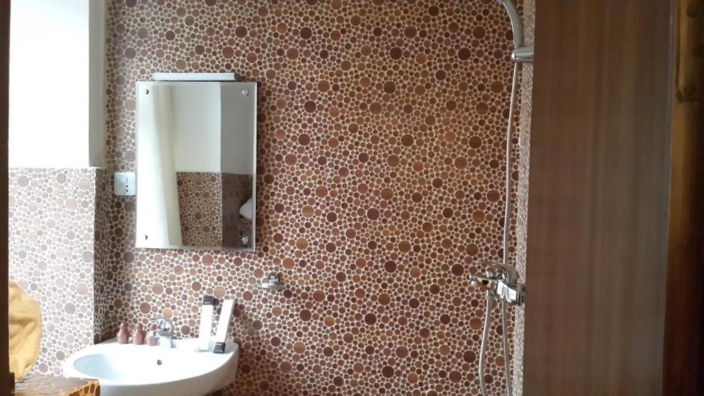 Koupelna v ubytování Hotel Heranya