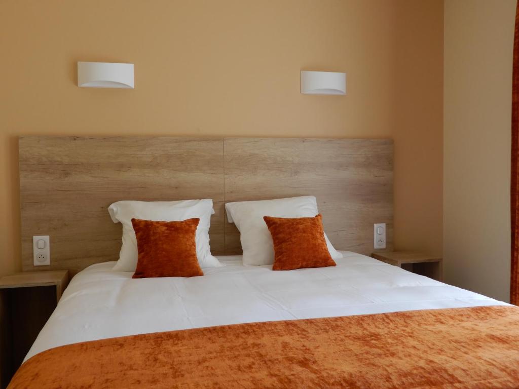 Postel nebo postele na pokoji v ubytování Hotel Marinet
