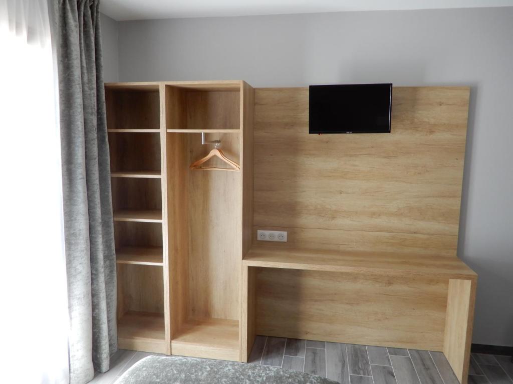 TV a/nebo společenská místnost v ubytování Hotel Marinet