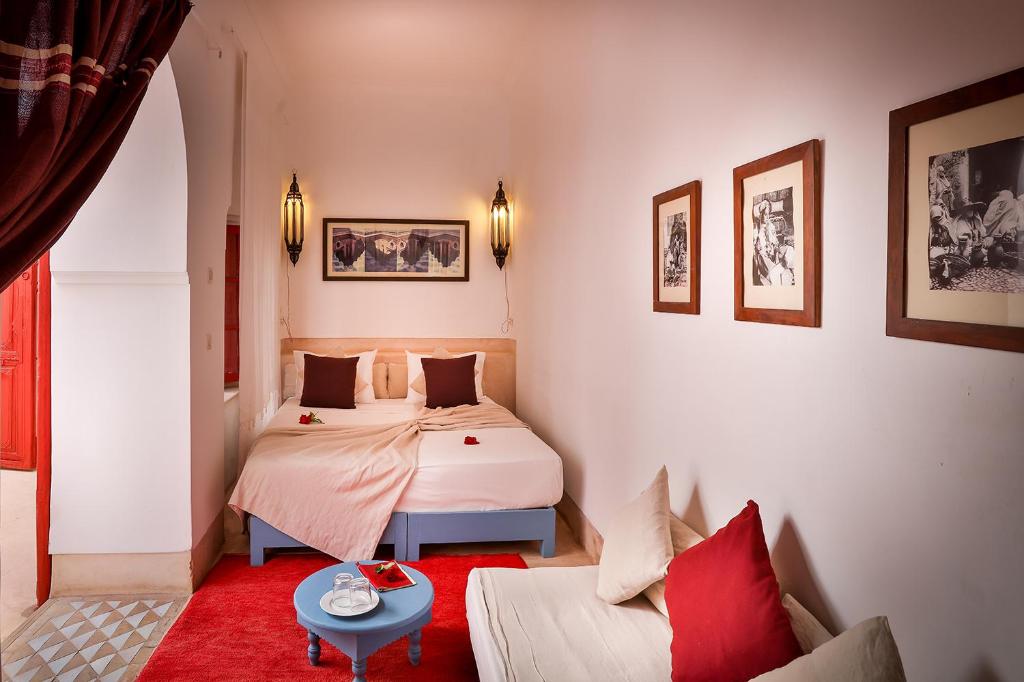 Postel nebo postele na pokoji v ubytování Hotel & Spa Dar Baraka & Karam